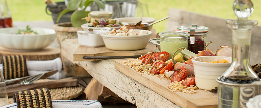 An al fresco picnic spread made of fresh local produce