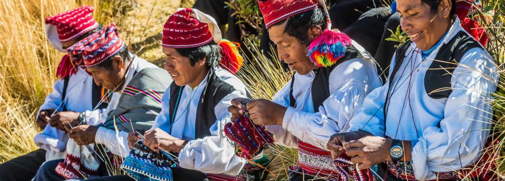 Uros people weaving on Lake Titicaca, Peru