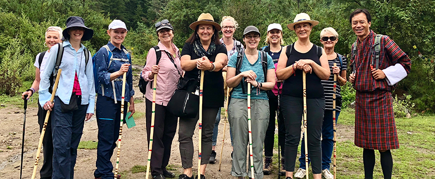 Hikers pose after an epic trek through Bhutan