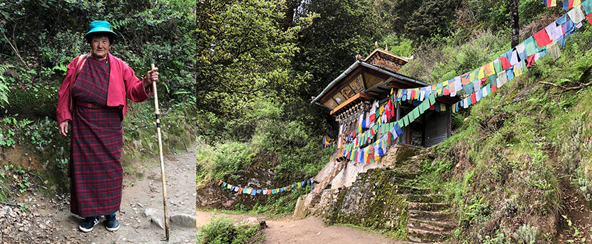 A woman walks on a hiking trail in Bhutan