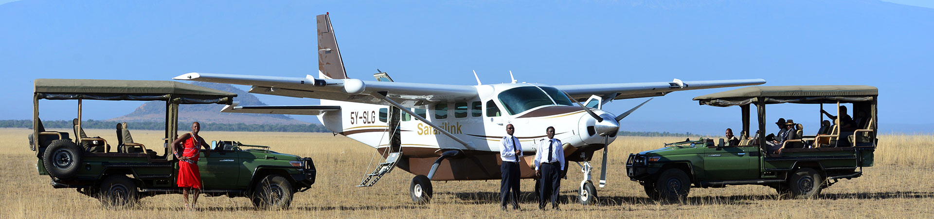 Light aircraft waits for guests on the Masai Mara for a safari transfer