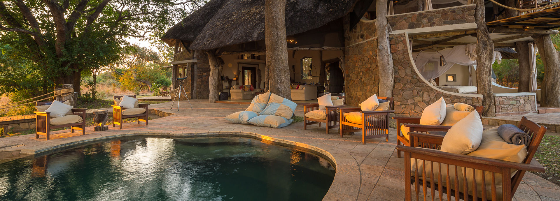 Poolside luxury at Luanwga Safari House, Robin Pope Safaris