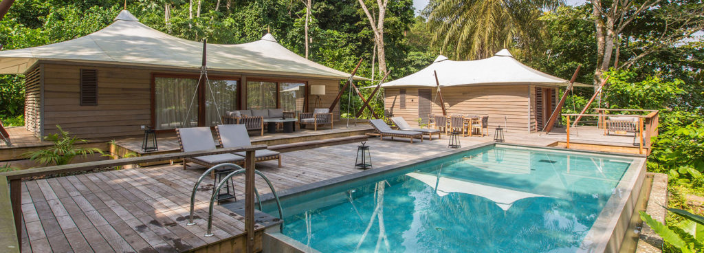 Shade beneath banana trees in the breeze at Sundy Praia
