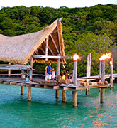 A romantic cabin over water at the luxurious Haggerstone Island Lodge