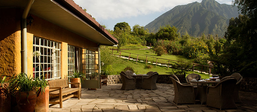 Elegant guest rooms at Sabyinyo Lodge overlook the surrounding mountains of the Volcanoes National Park