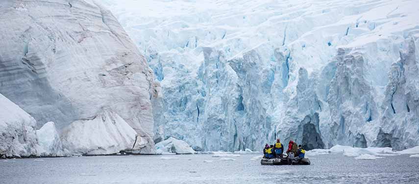 Zodiac In Antarctic Peninsula Surrounded By Icebergs, Antarctica
