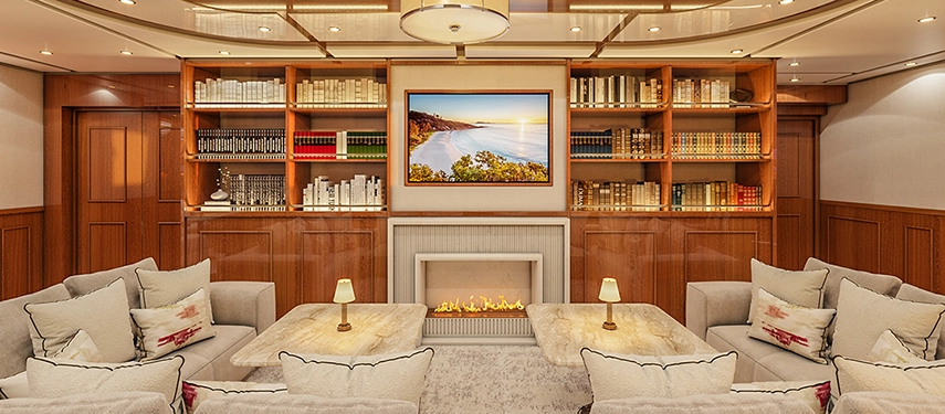 Inviting saloon and bar area featuring plush seating, marble accents and ocean views.