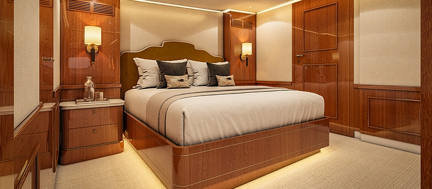 Warm wood-panelled suite with luxurious bedding and soft ambient lighting.
