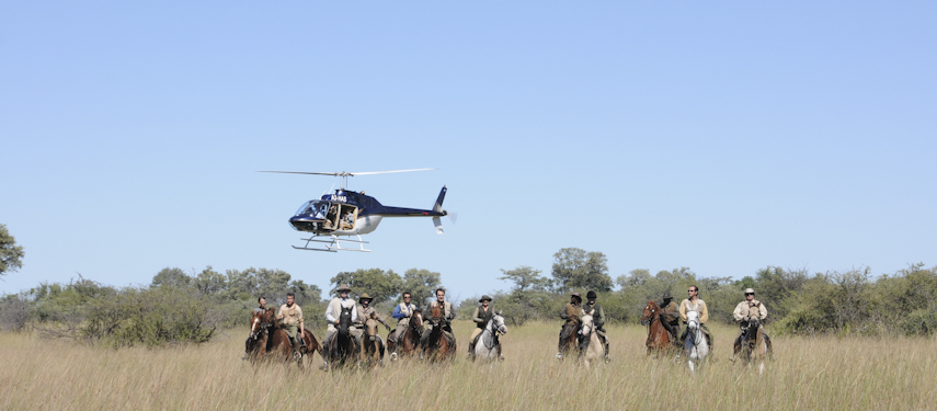 Helicopter and horse back safari in the Okavango Delta with African Horseback Safaris staying at Macatoo