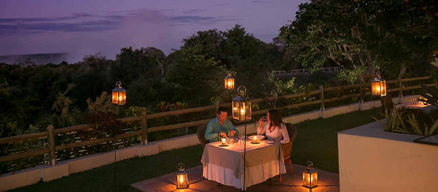 Lantern-lit al fresco dining at Cassia Restaurant, Ilala Lodge